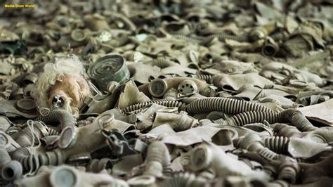 Haunting photos show dozens of gas masks littering Chernobyl as nature ...