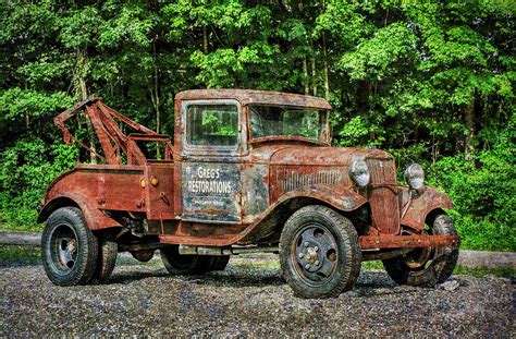 Antique Tow Truck Signage Photograph by Betty Denise - Fine Art America