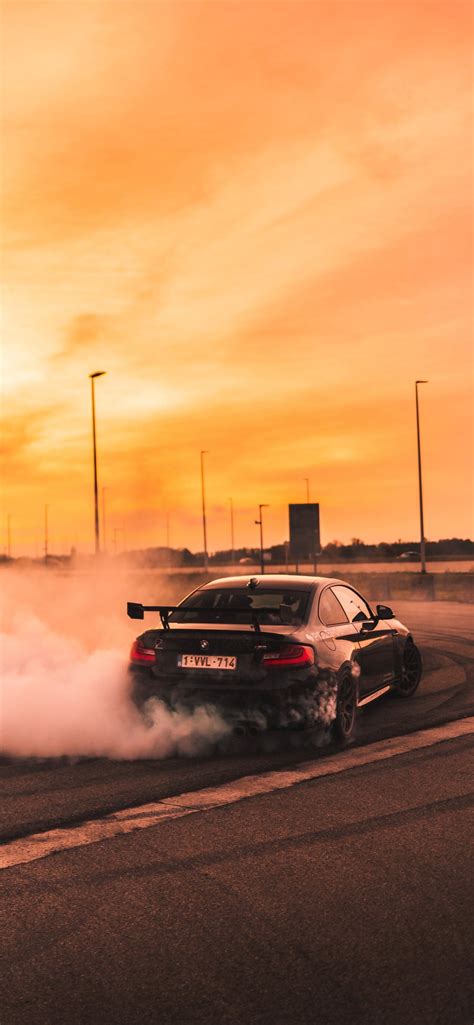 black car drifting on road during day iPhone Wallpapers Free Download