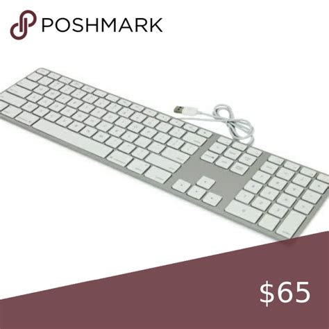 Apple Keyboard with Numeric Keypad Wired Keyboard. Two USB 2.0 ports ...