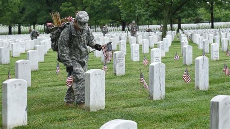 Honoring the Fallen: Soldiers Adorn Cemetery With American Flags in Time-Honored Tradition - ABC ...