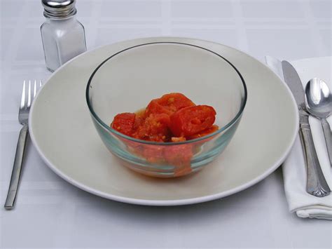 Calories in 0.75 cup(s) of Tomatoes - Stewed - Canned.