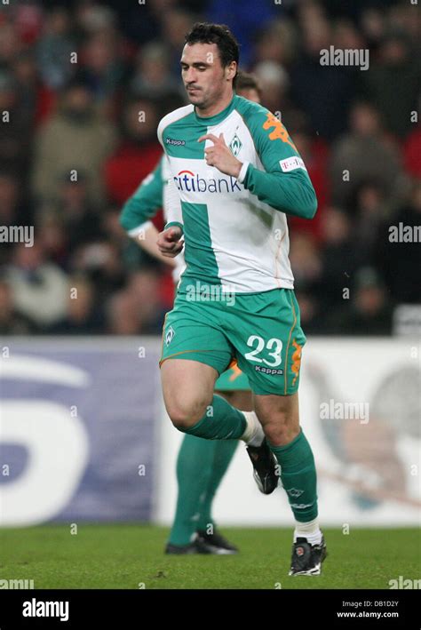 Hugo Almeida of Bremen is sent off the pitch after getting a red card ...