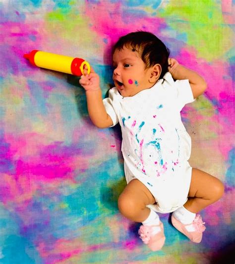 Trending Holi baby photoshoot ideas at home to choose from.