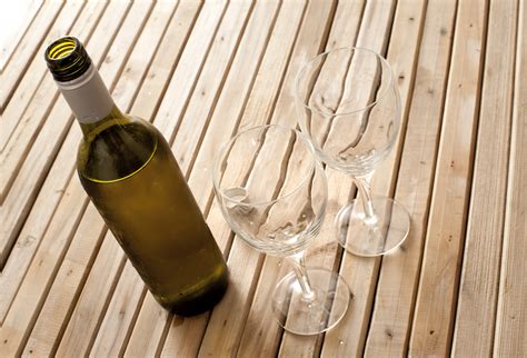 Bottle of white wine with glasses - Free Stock Image