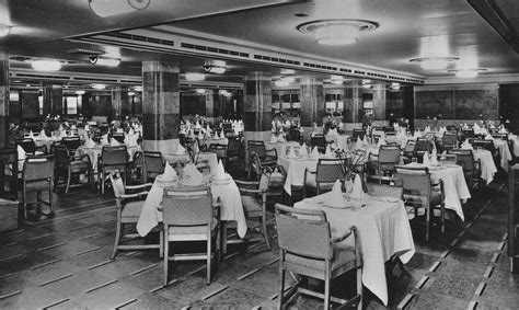 The Tourist Class Dining Room of the Queen Mary of 1936, flagship of the newly amalgamated ...