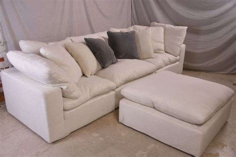 Large off-white scatter back 3 piece sectional sofa with ottoman; 205 ...