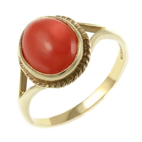 9ct yellow gold 10mm x 8mm oval coral ring - Jewellery from Mr Harold ...