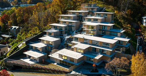 kengo kuma's staggered house units climb a mountainside in japan ...