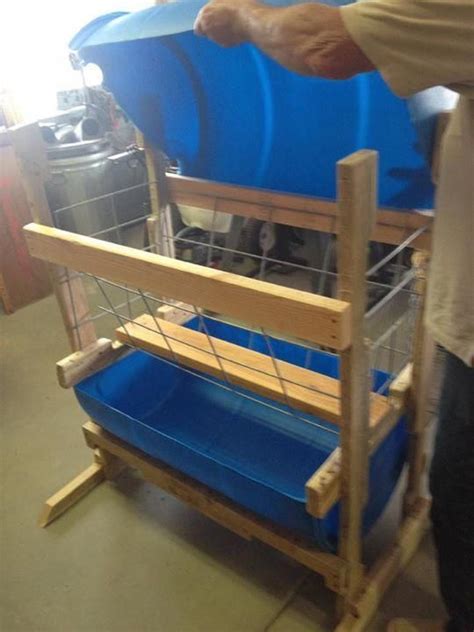 Low waste goat feeder … | Goat farming, Pygmy goat, Sheep feeders