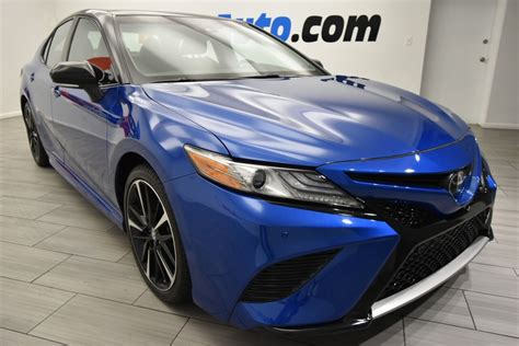 Blue Toyota Camry Hybrid