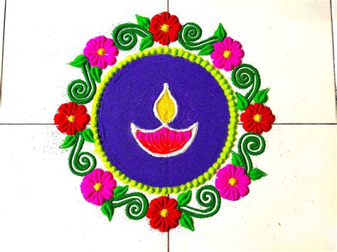 diya rangoli for diwali | Beautiful rangoli designs, Diya rangoli, Flower rangoli