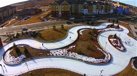 Maple Grove Central Park Outdoor Ice Skating Loop filmed by a drone ...