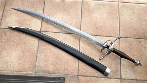 Nice hybrid build of a swiss-style two handed saber, with a Hanwei "Sentinel" blade and fittings ...