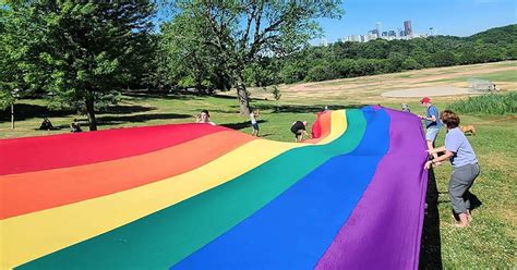 Giant rainbow flag unfurled in Toronto park for Pride