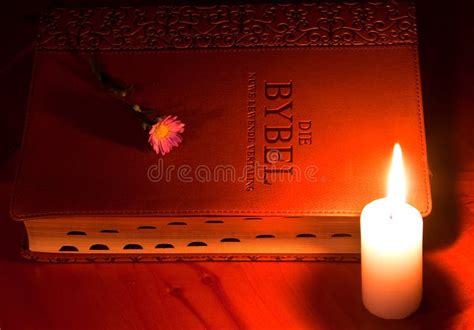 Closed Bible by Candle Light Stock Image - Image of light, belief: 14815207