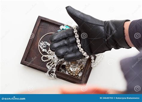 Stealing Jewellery Stock Photos - Image: 34640703