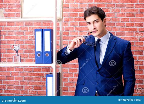 The Young Employee with Employee of the Month Trophy Stock Image - Image of award, month: 126276403