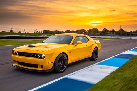 Online crop | yellow Dodge Challenger on road at golden hour HD ...