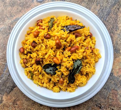 Tamarind Rice Recipe | Pulihora Recipe | Puliyogare - VegeCravings