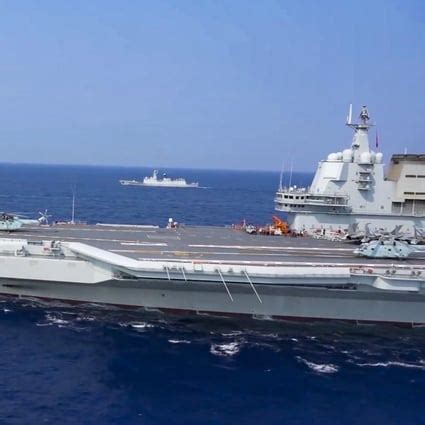 China says Shandong aircraft carrier handled foreign reconnaissance ...