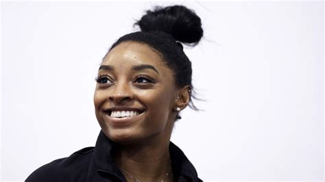 Everything We Know About Simone Biles' Adoption Journey