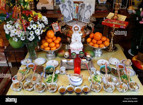 Chua Tu An Buddhist temple. Ancestor altar. Vegetarian offerings. Saint-Pierre en Faucigny ...