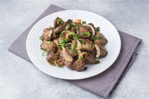 Baked Chicken Liver with Onion on a Plate Stock Photo - Image of onion ...