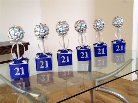 Great centrepieces for the tables at a 21st party. #chocolate #centrepiece #21st #party #blue # ...