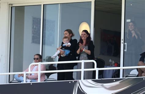 Travis Head's wife, Jessica Head, née Davies, and child watch the game ...