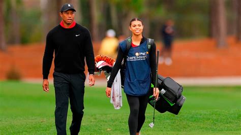 Tiger Woods' daughter Sam serves as his caddie for 1st time - ABC News