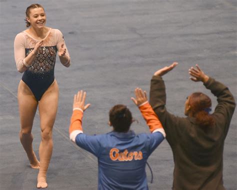 Florida gymnast Savannah Schoenherr meets her teammates on the ...