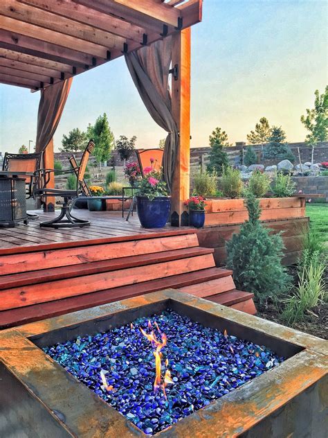 Firepit and deck combo with great looking Pergola built with OZCO's Ornamental Wood Ties ...