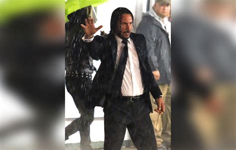 Keanu Reeves Seen Bruised And Soaking Wet On Set Of ‘John Wick 3: Parabellum'