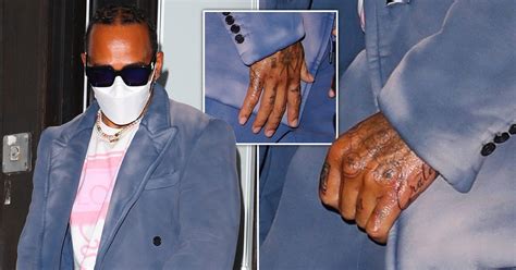 Lewis Hamilton shows off cryptic hand tattoos as he adds to planets ...