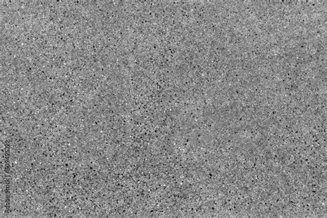 Foto de Seamless asphalt road background. Grainy floor texture with gravel particles, small ...