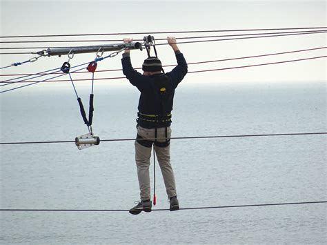 Man Servicing Zip Line Cables Free Stock Photo - Public Domain Pictures