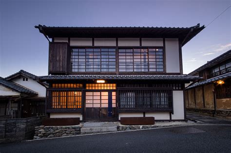 traditional 'kominka' houses in rural japan preserved and converted into high-end lodgings