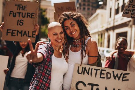 Female Activists with Placards and Peace Sign Stock Photo - Image of ...