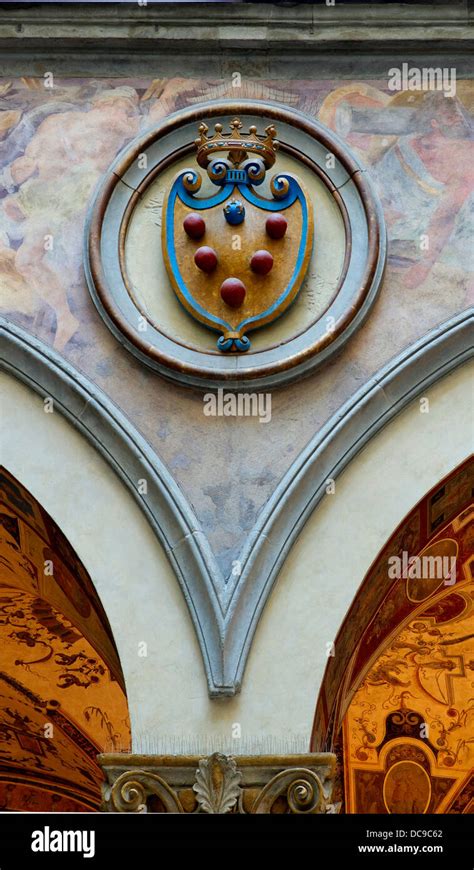 The coat of arms in relief of the Medici family in the courtyard of Michelozzo Palazzo Vecchio ...