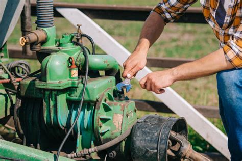 Farm Tractor Maintenance Stock Photos, Pictures & Royalty-Free Images - iStock