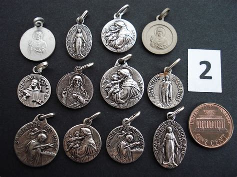 Pin by Darlene Filzen on saint medals in 2024 | Antique medals, Unique jewelry designs, Catholic ...