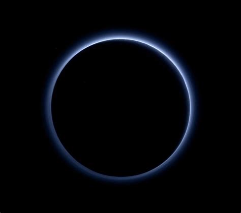 NASA’s New Horizons Probe Glimpses Pluto’s Icy Heart - The New York Times