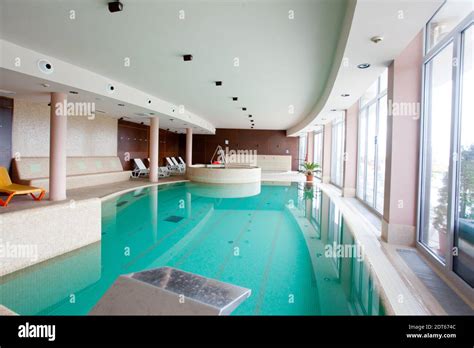 Exclusive indoor swimming pool with clear water Stock Photo - Alamy