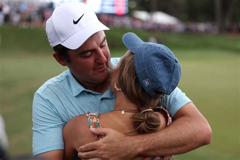 Scottie Scheffler hugs wife Meredith after Players Championship win