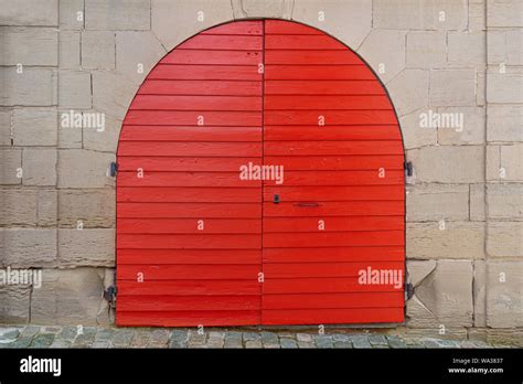 Red round wooden gate Stock Photo - Alamy