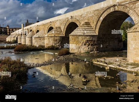 Guadalquivir river with the Roman bridge in Cordoba. Spain Stock Photo - Alamy