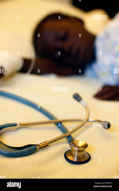 Sick child in hospital Stock Photo - Alamy