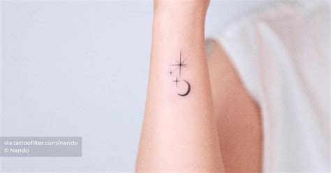 Stars and moon tattoo done on the wrist, minimalistic