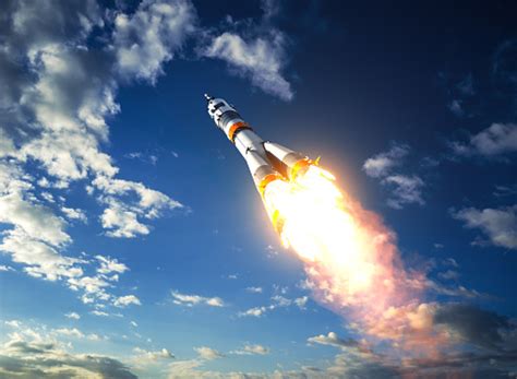 Carrier Rocket Takes Off To The Clouds Stock Photo - Download Image Now - iStock